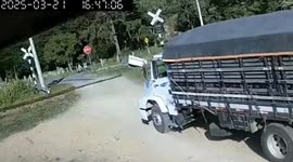 Train crashes into truck on level crossing in Brazil