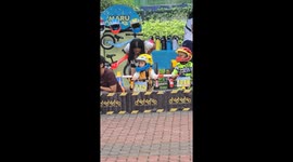 Toddlers with impressive balance race with push bikes without pedals