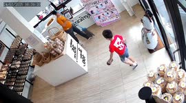 Mother and son narrowly avoid pickup truck hurtling into shop