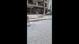 Intense hailstorm floods streets in Andalusia, Spain