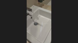 Hotel Sink Sprays Water Over Basin
