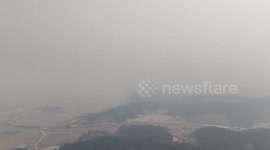 South Korea forest fires blanket region in thick smoke