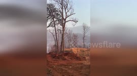 Light rain falls on Black Cove Complex fire in North Carolina