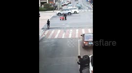 Police officers swoop in to rescue 3 young children wandering into busy traffic