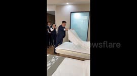 Hotel manager puts on class for staff on how to make the perfect bed