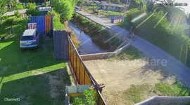 Motorcyclist falls into ditch after stopping in front of gate in Chile