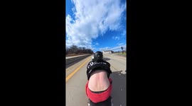Motorbike rider crashes into vehicle