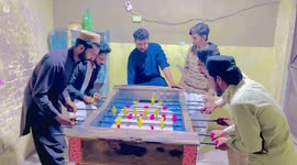 Man loses balance and falls onto foosball table in Lahore, Pakistan