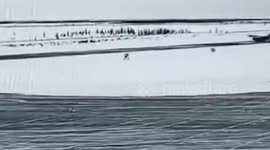 Cargo plane crash lands in thick snow in Russia
