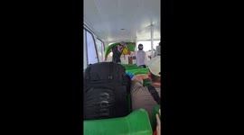 Wave crashes through boat amid rough sea in Bali
