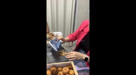 Woman uses iron to package cookies in viral hack
