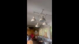 Cafe lights sway as earthquake jolts buildings in Bangkok
