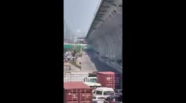 Earthquake causes sinkhole to open in road in Bangkok