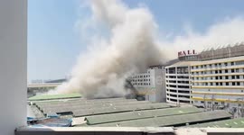 Building collapse next to tourist market traps dozens as earthquake rattles Bangkok