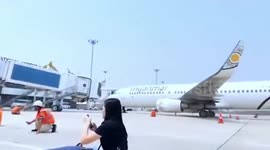 Passengers crowd on airport tarmac as Myanmar earthquake causes carnage