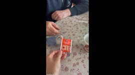 Blue Lovebird Opens Tea Bag