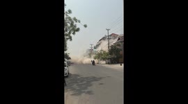 Myanmar earthquake residents run from building shaking from tremors