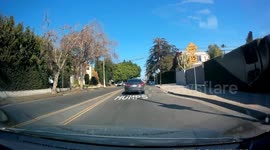 Woman Throws Drink On Car Behind Her