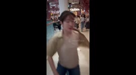 Shoppers flee Central World shopping mall in Bangkok during earthquake