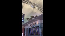 Chandelier lamps shake during earthquake at Suvarnabhumi Airport, Bangkok, Thailand