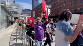 Demonstrators gather outside Tesla showroom in New York City