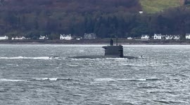 Dutch submarine HNLMS Dolfijn on a stormy Loch Long in Argyll Scotland this afternoon