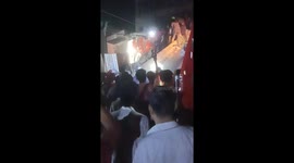 Locals cheer as survivors are pulled from Myanmar earthquake rubble