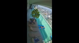 Tourists flee rooftop pool in Bangkok as it shakes during earthquake