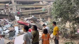 Rescue teams sift through collapsed building in Myanmar earthquake aftermath