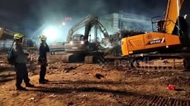 Rescue teams search skyscraper debris in Bangkok following earthquake