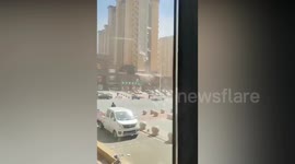 High-rise cladding horror as side of apartment block slides off