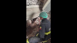 Firefighters plough through debris to search for Myanmar earthquake survivors