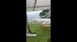 Storm blows over wedding marquee in Bali