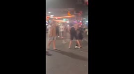 Tourists fight in front of bar in Phuket