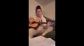 Dog disrupts owner’s guitar playing by throwing cushions in Tredegar, UK