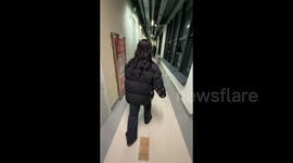 China: Girl Slips and Falls in the Hallway