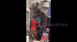 China: Yangko Dance on Train Aisle