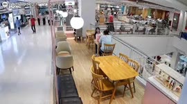 Indoor train crashes into diners drinking coffee in shopping mall in Thailand