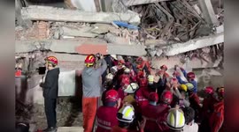 Russian and Chinese firemen save woman stuck in Myanmar earthquake rubble