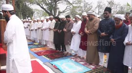 India: Indian Muslim  offer Namaz on the occasion of ‘Eid-ul-Fitr’ festival at Machkhowa Eid Field in Guwahati