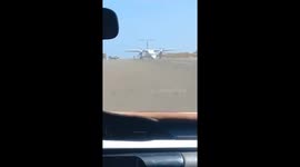 UN cargo plane scrapes along runway when nose gear collapses while landing