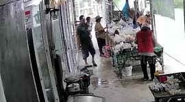 Grandfather slips while carrying baby... but prevents infant from harm