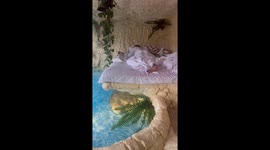 Step out of this hotel bed straight into a pool with a sea view