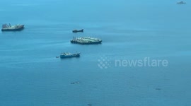 Aerial footage shows China's 'heavily fortified military base' in contested territory in South China Sea