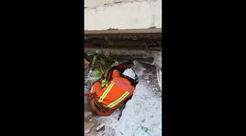 Rescuer flees as aftershock hits during rescue in Mandalay, Myanmar