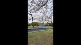 Dust devil tornado picks up tents as it rips through park in China