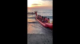 Holidaymakers nearly tall from dragon boat as wave causes wobble