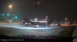 Subaru Runs Into Traffic Sign In Snow Storm on icy slick and snow covered roads
