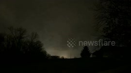 Funnel cloud forming over house with bad lightning in Evansville, Indiana