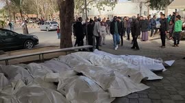 Gaza Strip: Relatives bid farewell to 18 Palestinians killed in Israeli airstrike on southern Gaza Strip